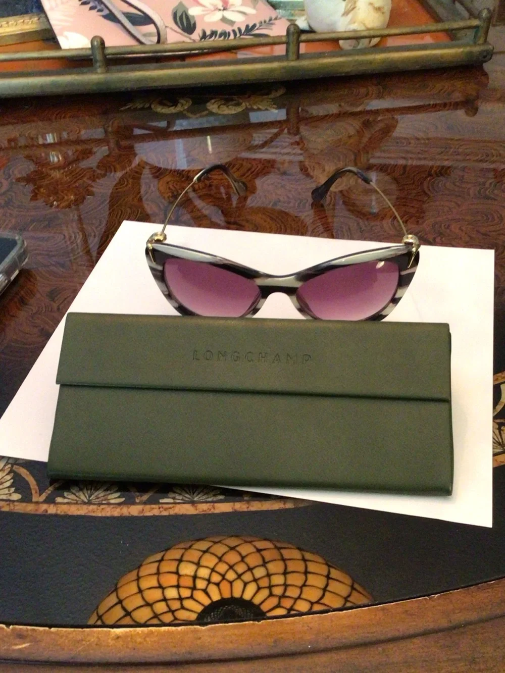 Elizabeth and James Black & White Striped Cat-Eye Sunglasses with Purple Lenses